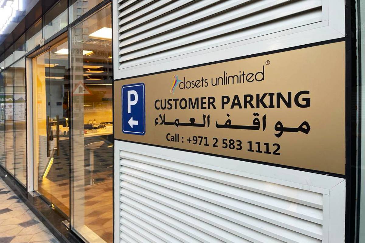 Wayfinding directional metal sign fabrication and installation at Tourist Club Area 