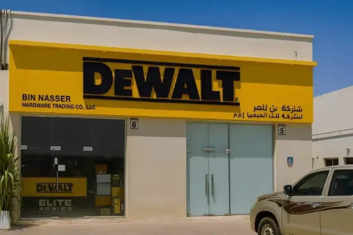Professional signage installation in Abu Dhabi featuring a 3D signboard of  DeWalt done By Ninety Nine Advertising LLC
