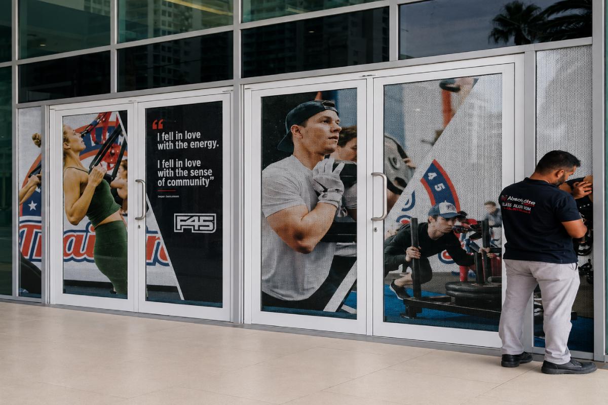 one way vision perforated sticker printing and installation in Abu Dhabi